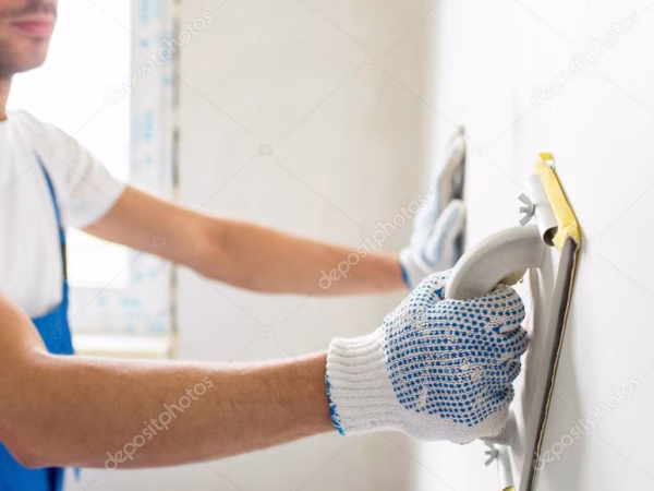depositphotos_87200946-stock-photo-close-up-of-builder-working