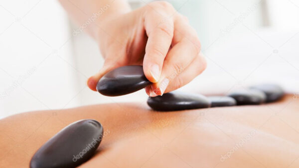depositphotos_35016425-stock-photo-man-getting-hot-stone-massage.jpg